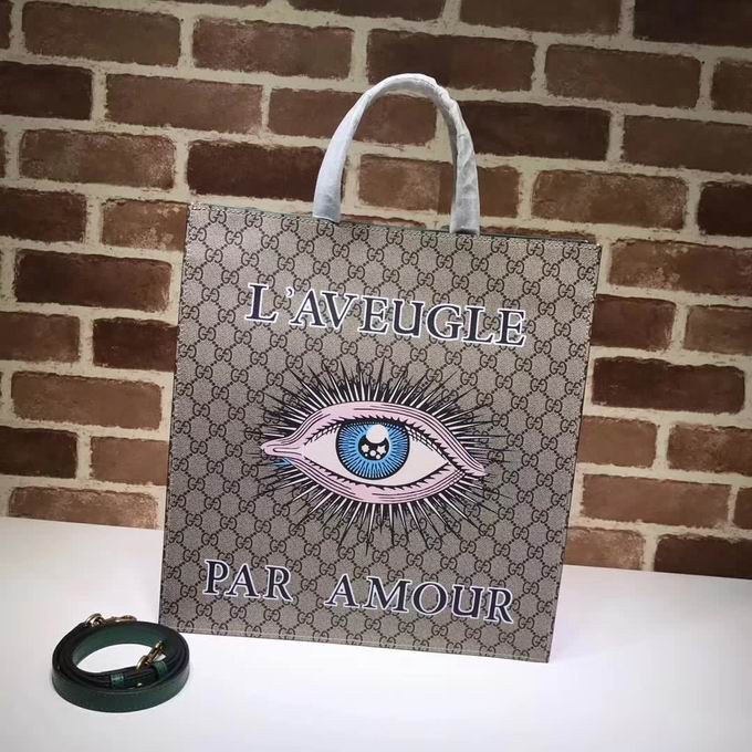  Gucci Big eyes print GG Supreme tote