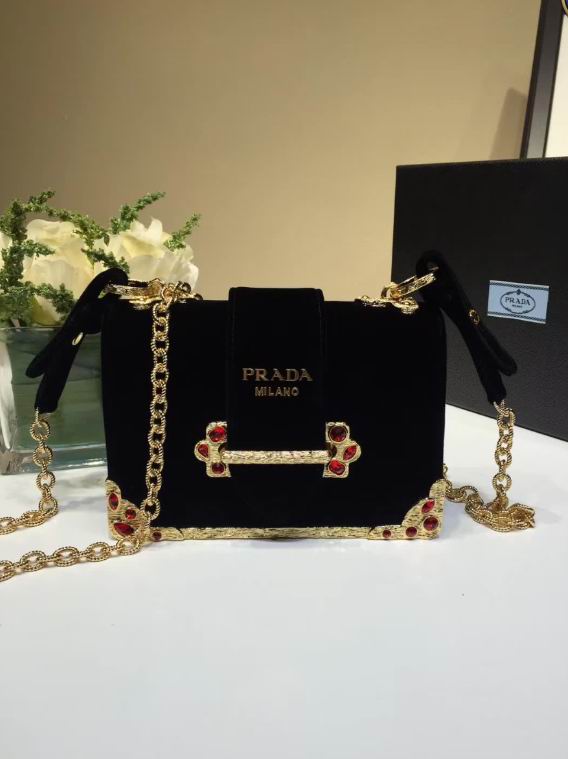 Prada Velvet bag with red gemstone