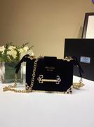 Prada Velvet bag with blue gemstone 