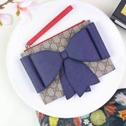 Gucci Childrens GG Supreme bow wristlet blue